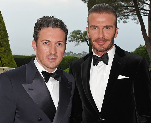 Winning team: David Beckham, right, and his long-term friend Dave Gardner, left, who has stepped down as a non-executive director of Guild Esports with 'immediate effect'