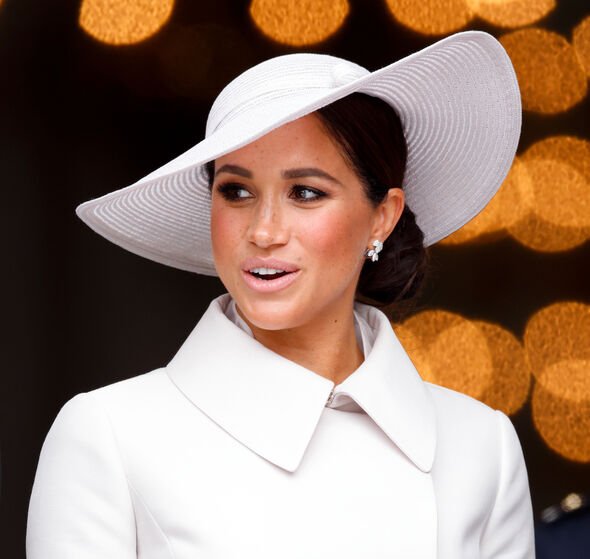 Meghan Markle wearing a white outfit