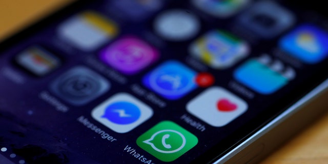 File photo: WhatsApp and Facebook messenger icons are seen on an iPhone.(REUTERS/Phil Noble )