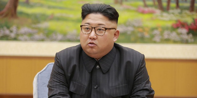 FILE- North Korean leader Kim Jong-Un attending a meeting with a committee of the Workers' Party of Korea about the test of a hydrogen bomb, at an unknown location.