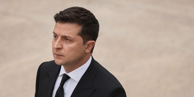 Ukrainian President Volodymyr Zelensky walks to the Tomb of the Unknown Soldier on September 1, 2021, in Arlington, Virginia. 