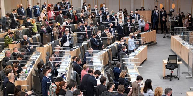 Austria's MPs are seen during a vote at a session of Austria's parliament Nationalrat on January 20, 2022, in Vienna. (Photo by ROLAND SCHLAGER/APA/AFP via Getty Images)