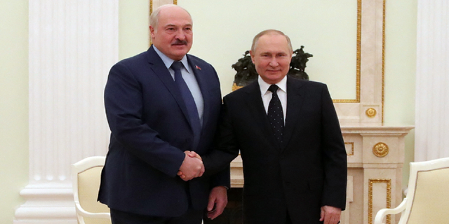 Russian President Vladimir Putin meets with his Belarus' counterpart Alexander Lukashenko at the Kremlin in Moscow on March 11. 