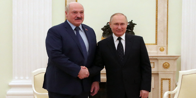 Russian President Vladimir Putin meets with his Belarus' counterpart Alexander Lukashenko at the Kremlin in Moscow on March 11.