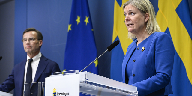 Sweden's Prime Minister Magdalena Andersson, right, and the Moderate Party's leader Ulf Kristersson give a news conference in Stockholm, Sweden, on Monday, May 16.