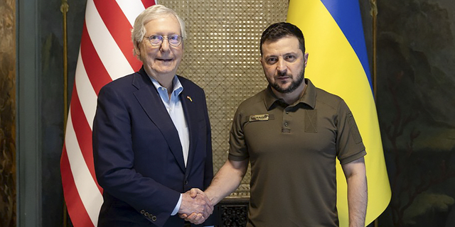 Ukrainian President Volodymyr Zelenskyy and Senate Minority Leader Mitch McConnell, R-Ky., pose for a photo in Kyiv, Ukraine, on Saturday, May 14.