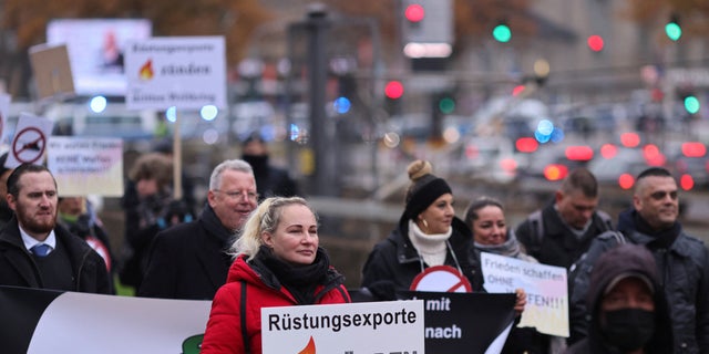 Elena Kolbasnikova, an organizer and leader of pro-Russia rallies, and originally from Ukraine, attends a rally in Cologne, Germany, Dec. 4, 2022.