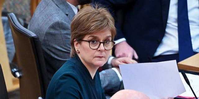 First Minister Nicola Sturgeon awaits the start of First Minister's Questions in the Scottish Parliament Jan. 26, 2023, in Edinburgh, Scotland. 